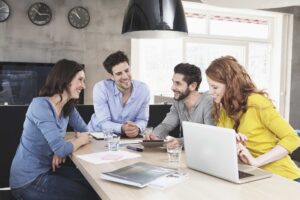 four-creative-people-at-business-conference-in-the-2022-12-16-22-14-35-utc